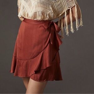 Anthropologie Maeve Ruffled Side Tie Wrap Mini Skirt in Rust